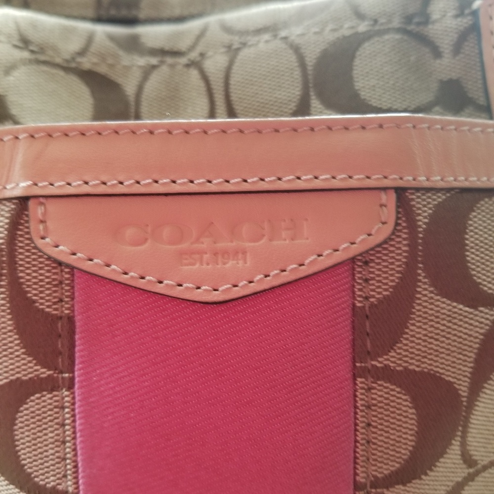 Pink and tan Coach handbag.